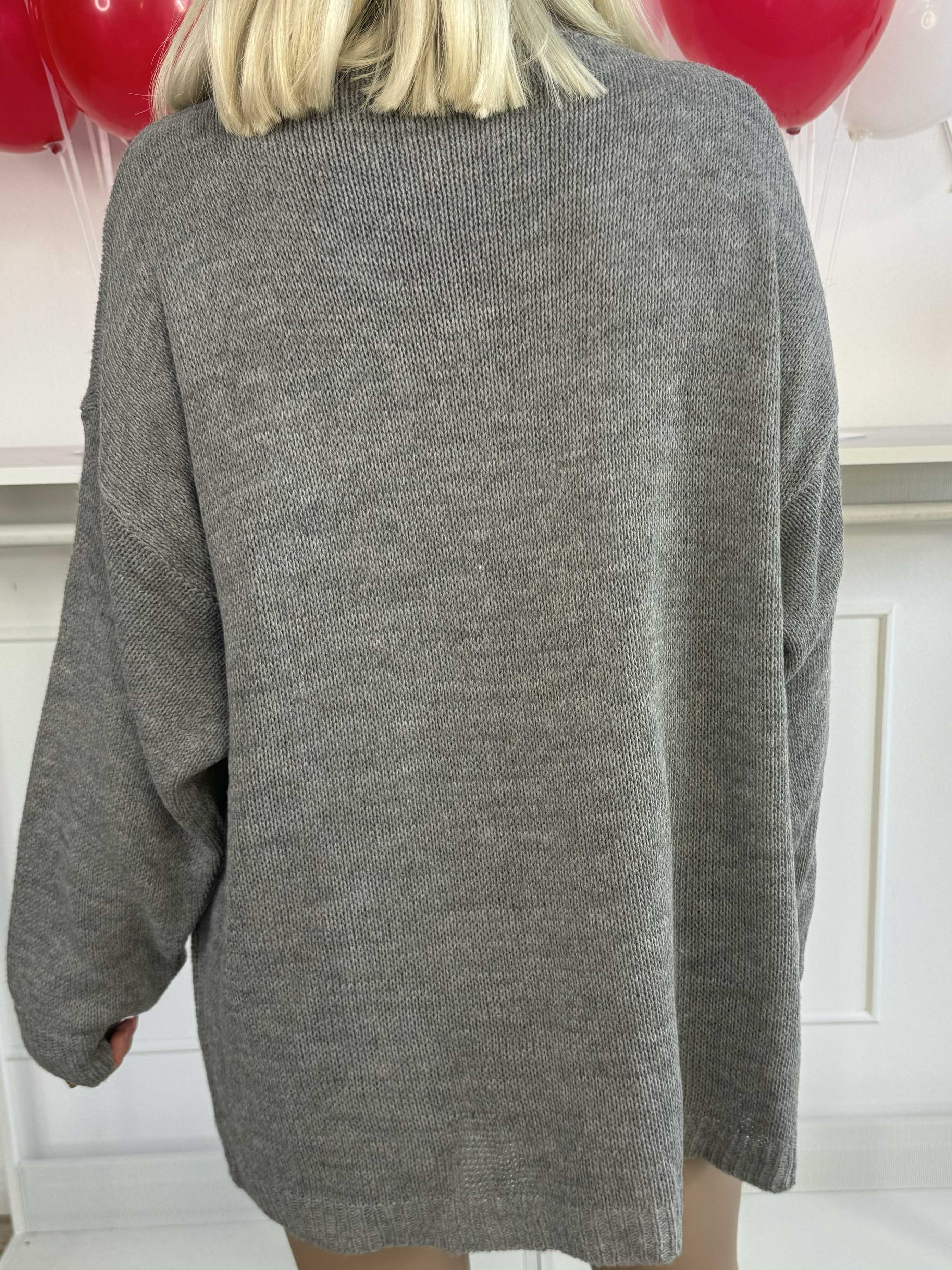 Rock - Strikbluse med stjerner i guldtråde